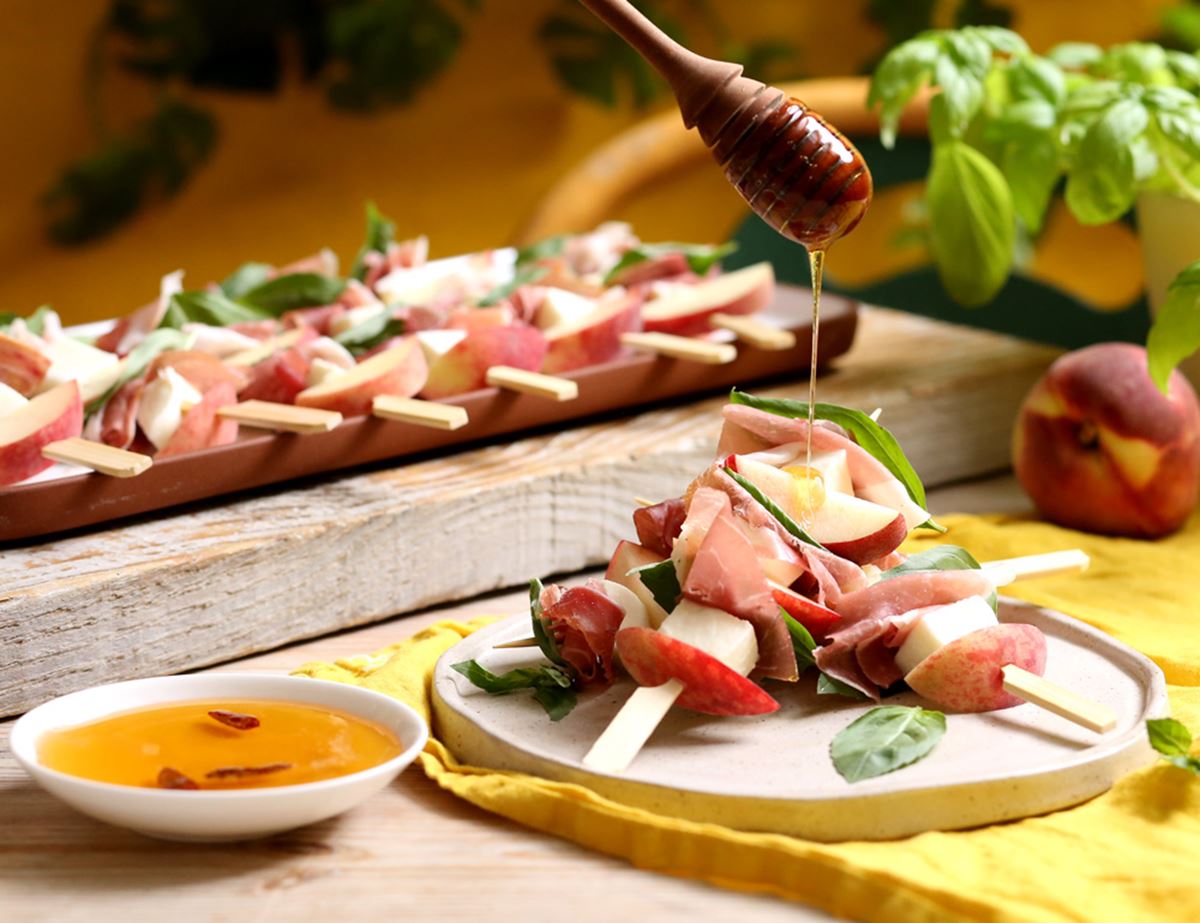 Peach, Mozzarella & Prosciutto Skewers with Hot Honey